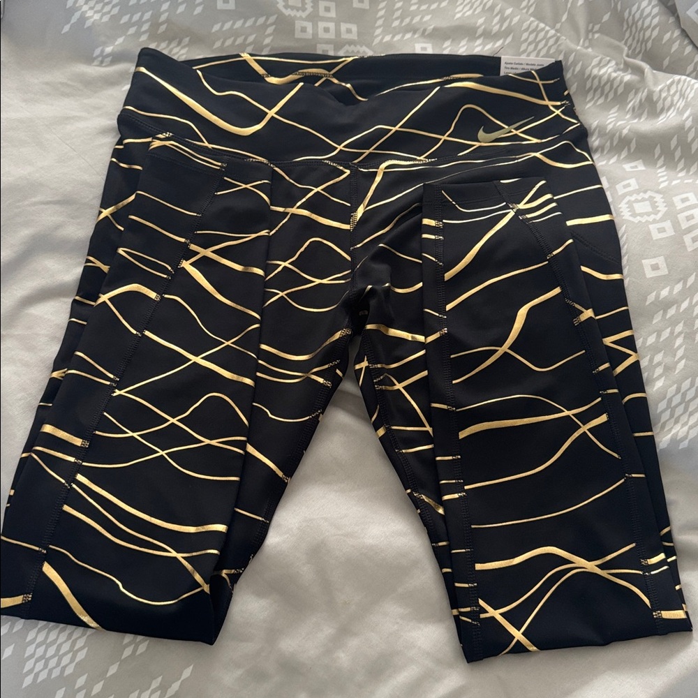Nike Black and Gold Mid Rise Leggings